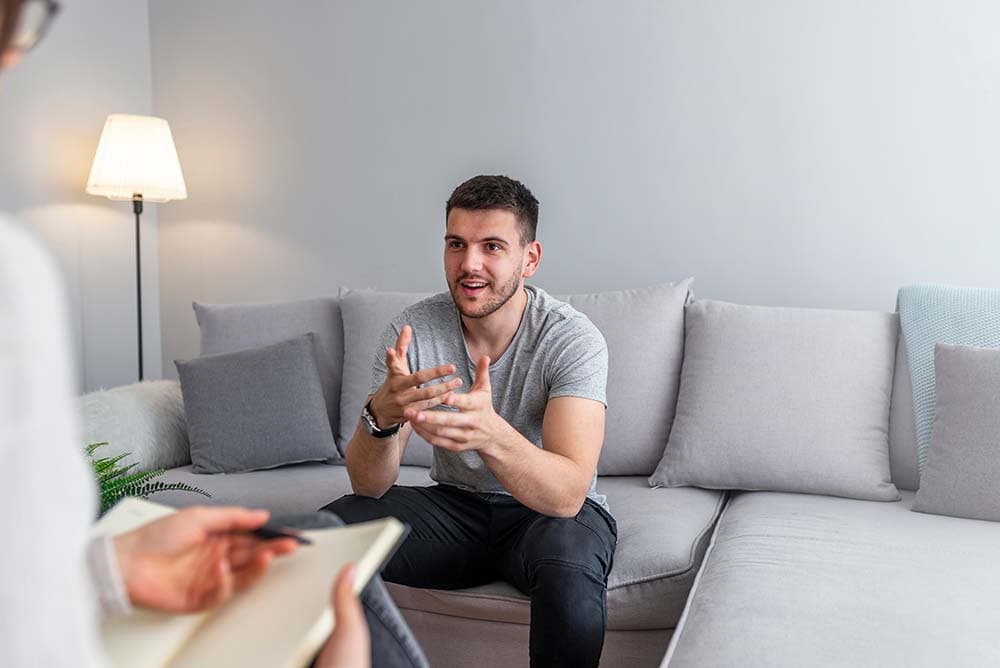 a man going to therapy for addiction treatment