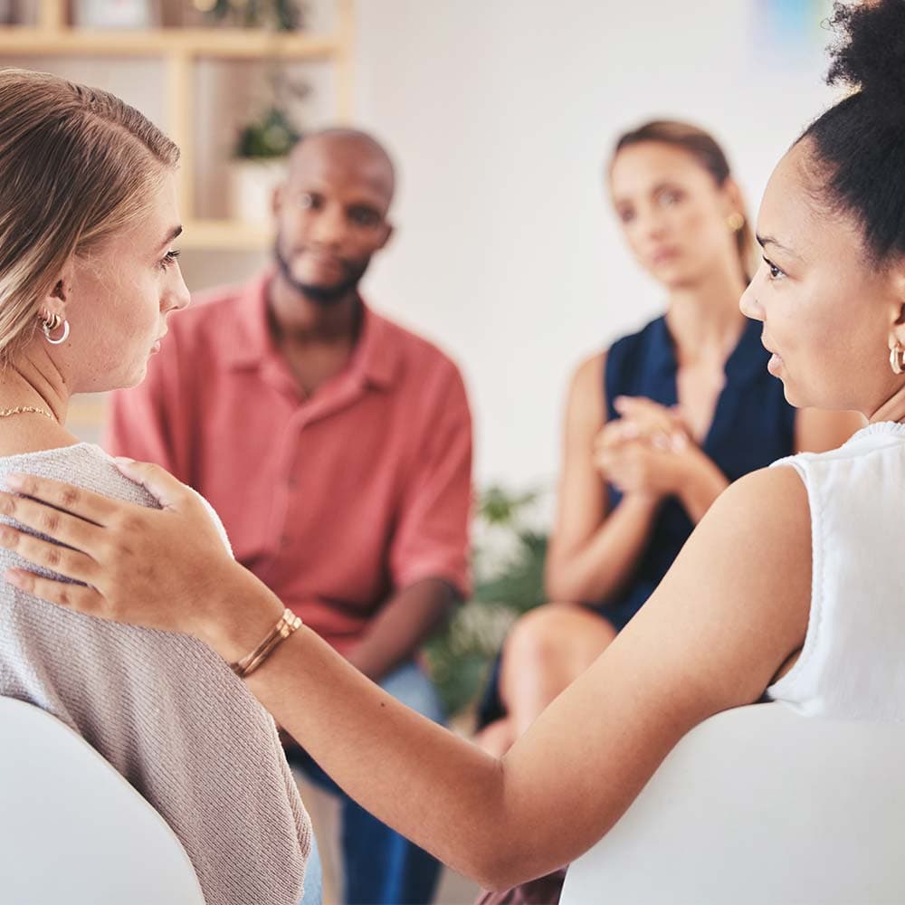 two people supporting each other through addiction treatment in Ohio