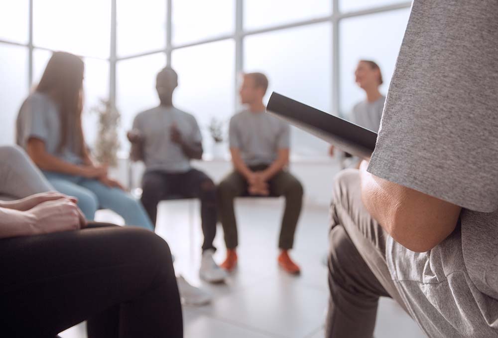 a group therapy session at an addiction treatment program in Ohio